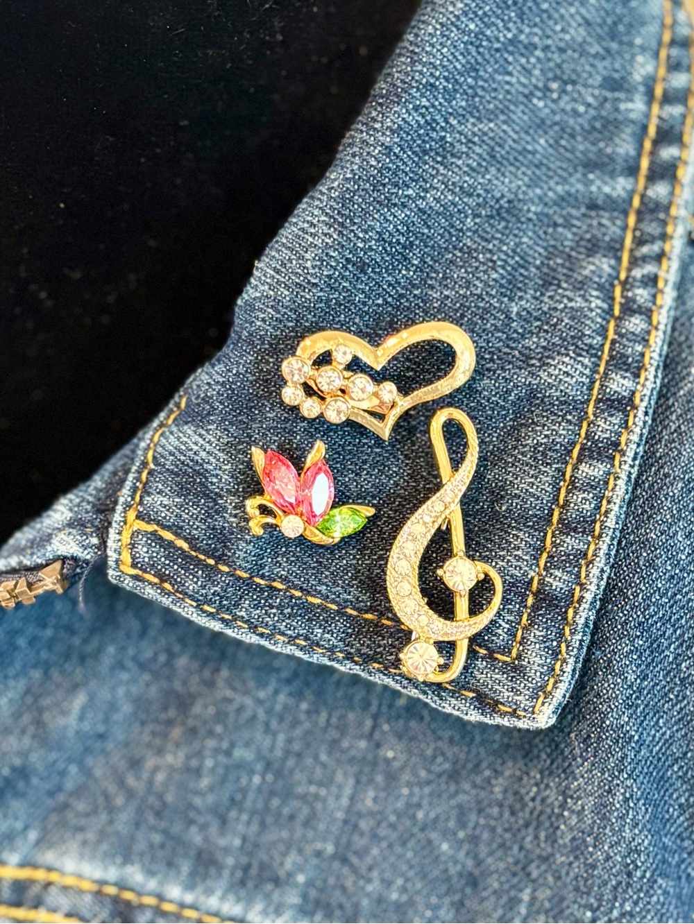 Set of Three Gold Tone and Rhinestone Brooches.